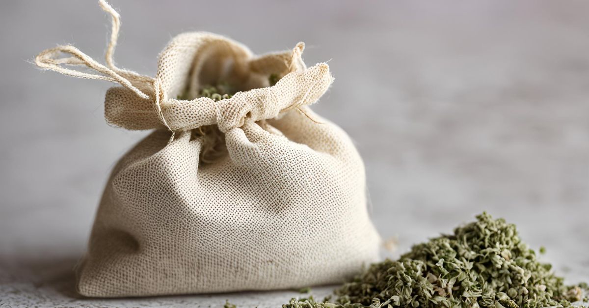 Small muslin bag filled with dried catnip, securely tied, used as a cat toy